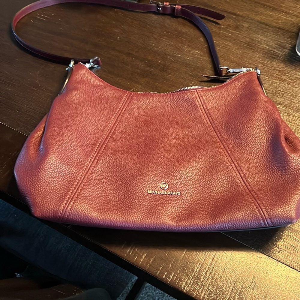 Beautiful MK purse cranberry color excellent condition